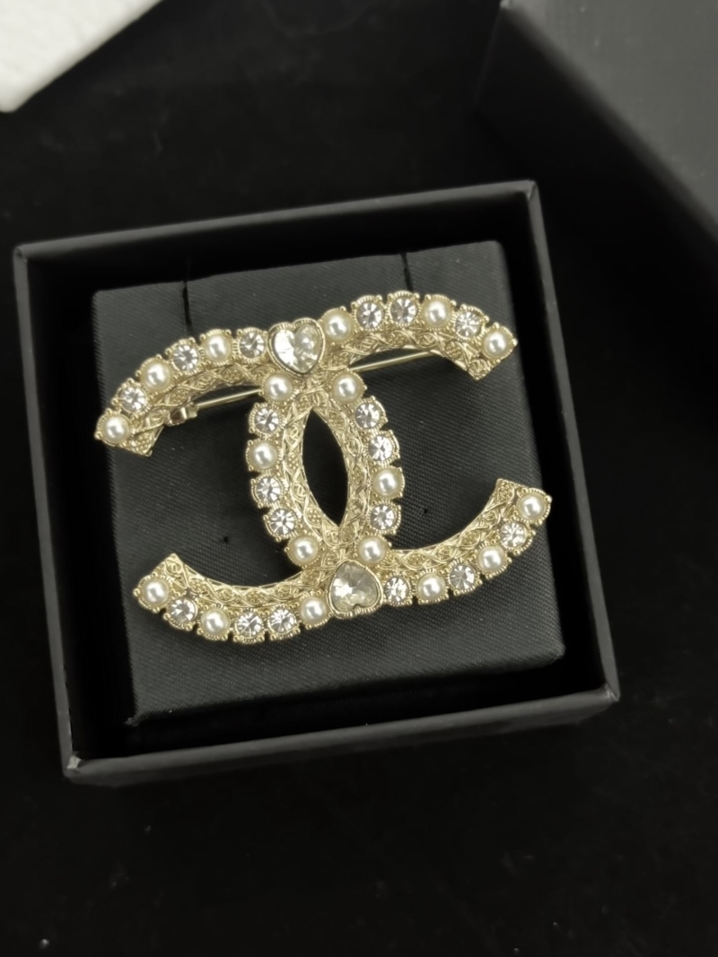 Ch**el brooches